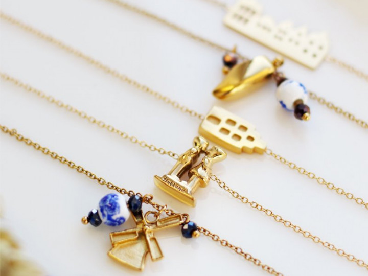 Diversen Armbanden molen, kuspaar, klomp en huis goud van My Jewellery voor Heinen Delfts Blauw